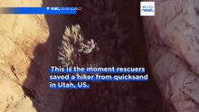 Moment hiker rescued from quicksand after activating SOS signal