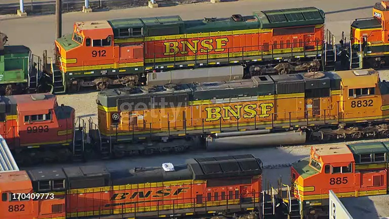 MS AERIAL View of BNSF engine cars on tracks / Topeka, Kansas, United States - HD stock videogettyimages-170409773-640_adpp