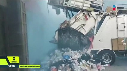 Trabajadores de limpia prenden fuego a basura en CDMX para exigir derechos laborales