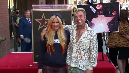 Avril Lavigne & Tyga Confirm Romance With Steamy Kiss At Paris Fashion Week