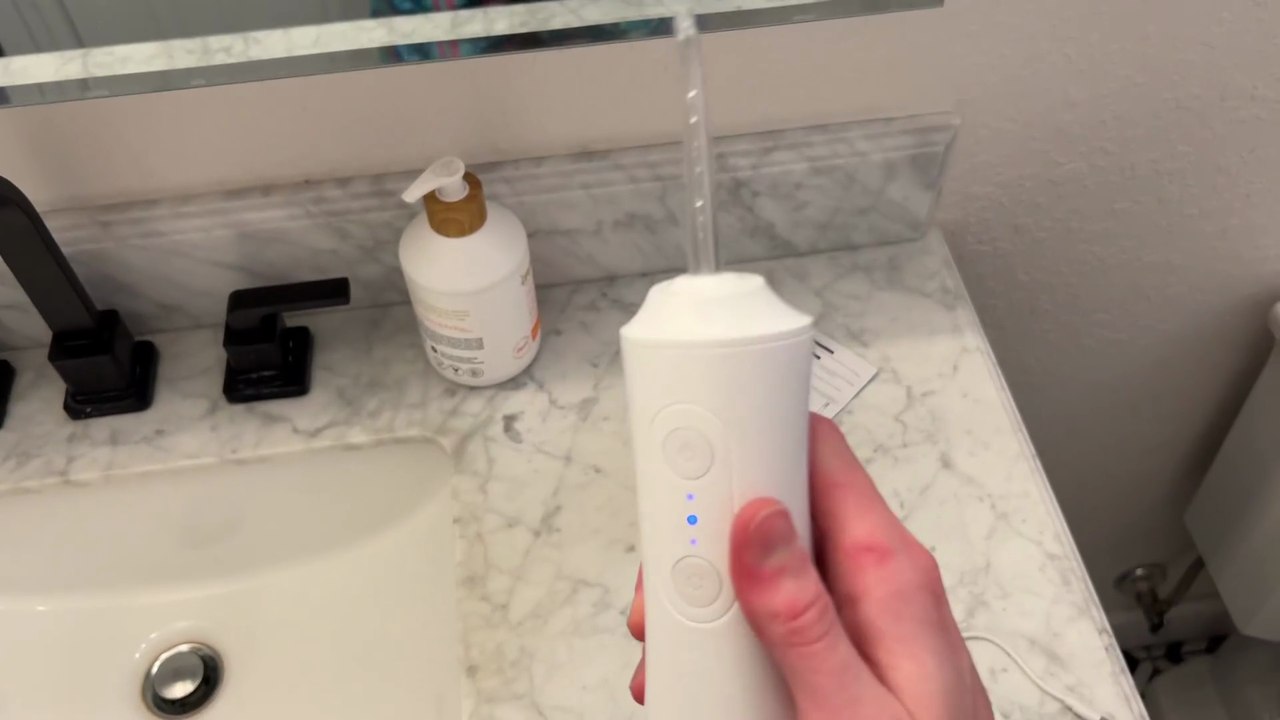 best electric water flosser for teeth cleaning, gum care, braces, and oral health, approved by the American Dental Association. Full review!