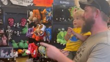 Toddler has the funniest reaction after being startled by a Halloween monkey display