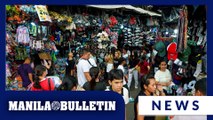 Shoppers flock to Divisoria in Manila to buy Christmas gifts