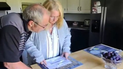 Woman surprises parents with a rescue dog she brought from the Bahamas