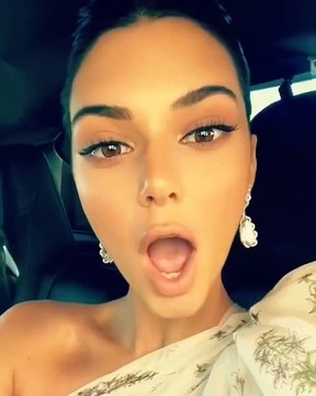 Kendall Jenner Flashes Legs In Stunning White Gown With 15ft Train At Cannes Pics