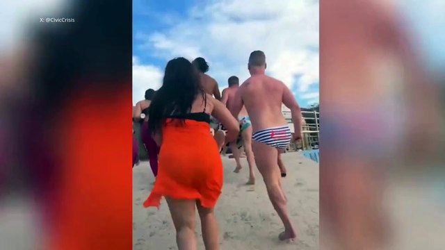 Several people experience a tense, panic-filled moment during a shooting in Sydney, Australia