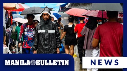 Shoppers buy clothing for Christmas despite heavy rains