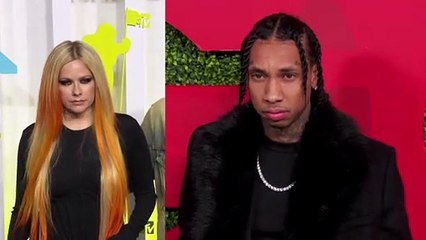 Avril Lavigne & Tyga Hold Hands As They Arrive Back In California For Date Night After Pfw