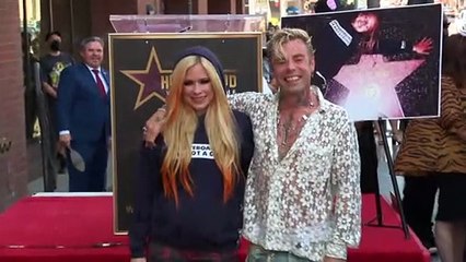 Avril Lavigne & Tyga Confirm Romance With Steamy Kiss At Paris Fashion Week