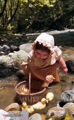 Adorable Baby in Bonnet Plays with Ducklings by a Sunny Forest Stream | Wholesome Nature Fun
