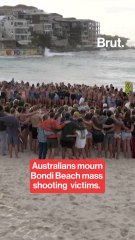 Australian beachgoers mourn victims of Bondi Beach mass shooting.