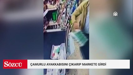 Mersin'de bir çiftçinin çamurlu ayakkabısını çıkararak markete girmesi kameraya yansıdı