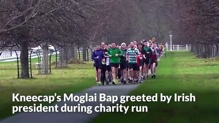 Kneecap’s Moglai Bap greeted by Irish president during charity run