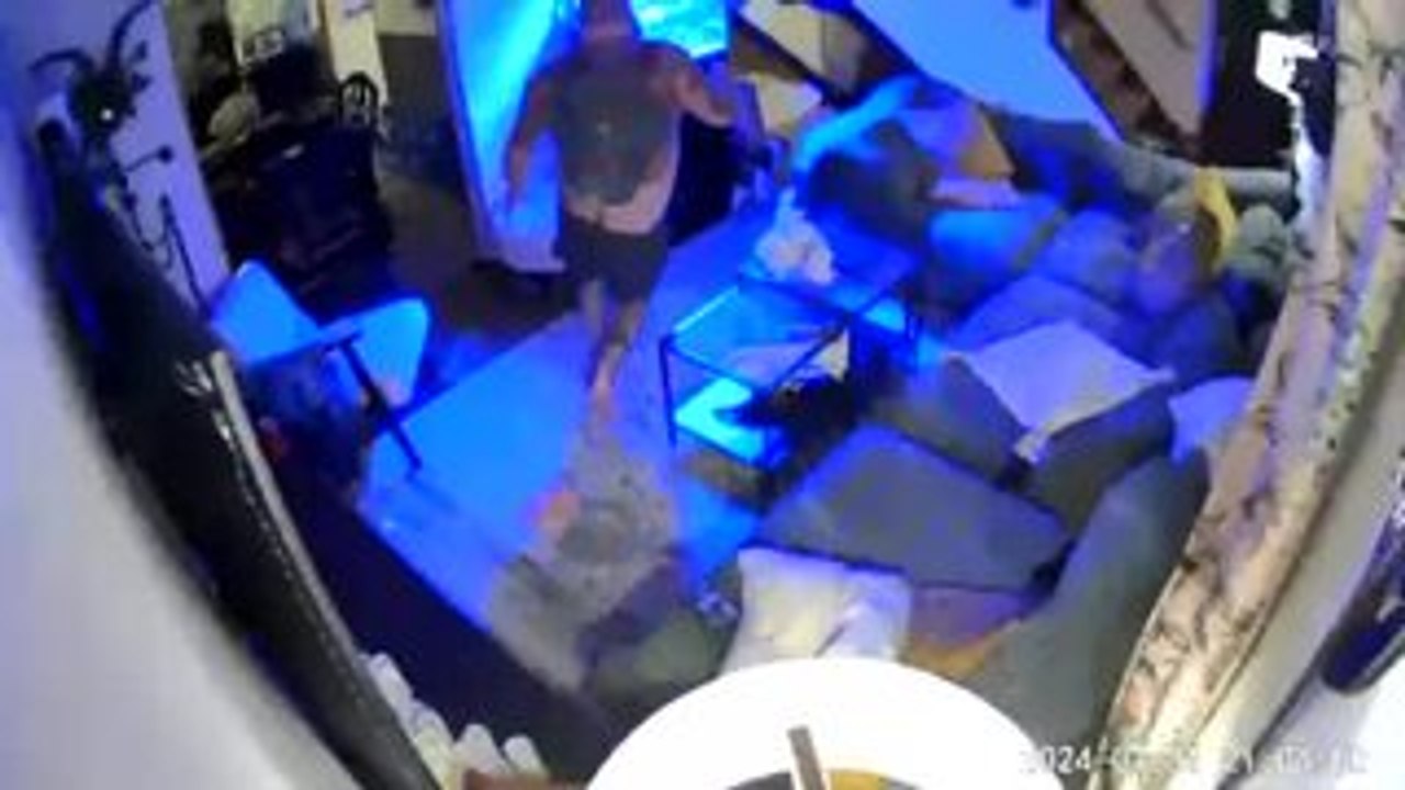 Mirror Topples Onto Fish Tank