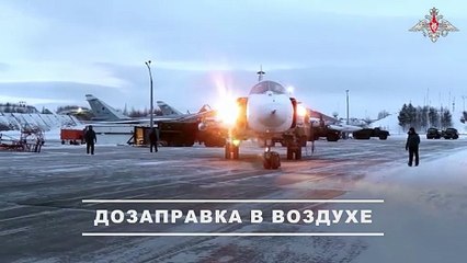 Su-24M crews practice aerial refueling under polar night conditions