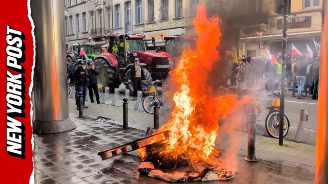 Farmers storm Brussels with tractors as fiery protest erupts outside Parliament
