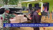 TNI-Polri Bagikan Bantuan Susu Presiden Prabowo ke Pengungsi Anak-Anak di Batang Toru