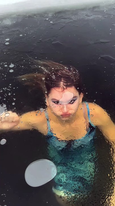 Ice Queen Escape: Woman Breaks Through Frozen Lake in Dramatic Winter Swim 🥶🧊