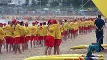 Australian lifesavers line Bondi Beach at vigil after massacre