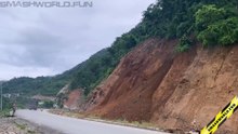 Sand slope collapses onto road
