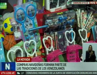 Familias venezolanas realizan compras navideñas para sus navidades felices