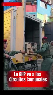 Venezuela's military distributing rifles to the people in working-class districts. These militias will form an armed resistance to defend their nation if the USA tries to occupy the country.