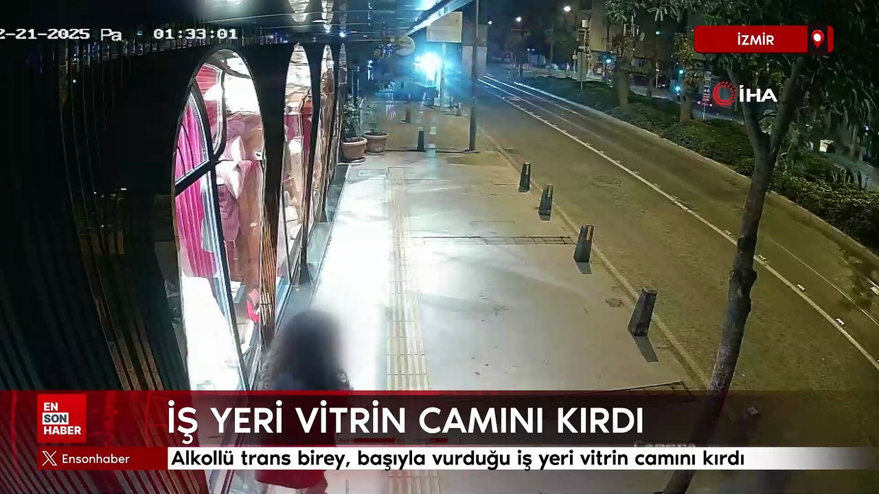 İzmir'de alkollü trans birey, başıyla vurduğu iş yeri vitrin camını kırdı