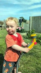 Toddler vs. Garden Hose: The Ultimate Showdown! ⛲