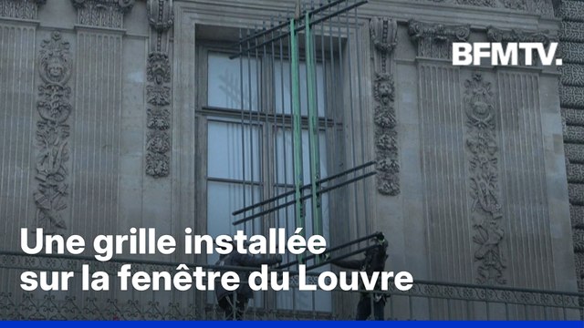 Une grille installée sur la fenêtre du Louvre par laquelle sont passés les voleurs