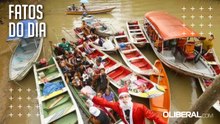Grupo de canoagem leva Papai Noel para doação de brinquedos na Ilha das Onças