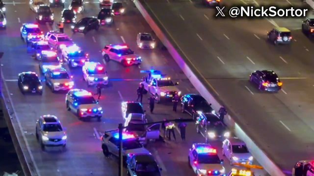 Officer down as police and National Guard flood I-695 near the U.S. Capitol.
