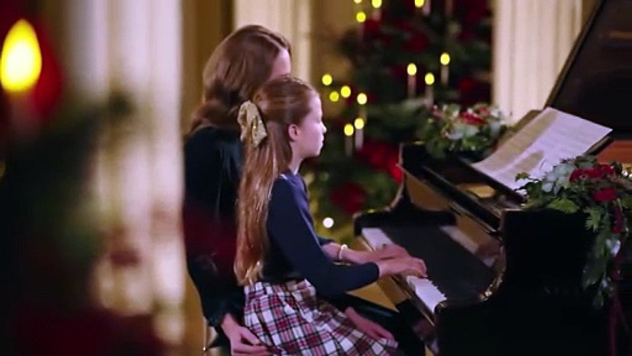 Kate and Charlotte perform together on the piano for royal carol concert