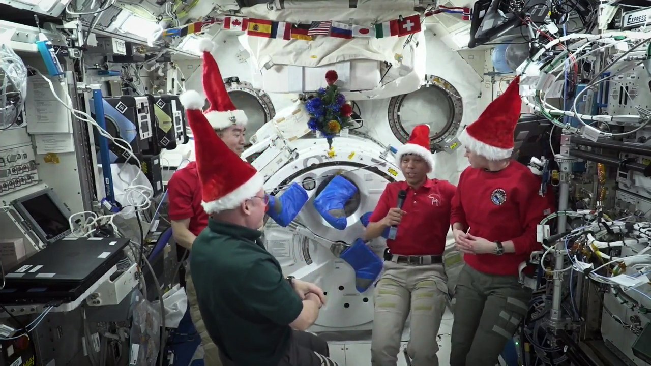 Happy Holidays from the International Space Station - 'With our space family'