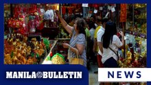 Shoppers buy lucky charms in anticipation of Year of the Horse 2026 in Binondo, Manila