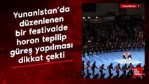 Yunanistan’da düzenlenen bir festivalde horon tepilip güreş yapılması dikkat çekti