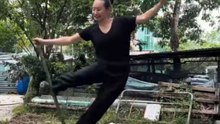 Woman experiences a comical mishap while attempting the challenging Monkey King pose