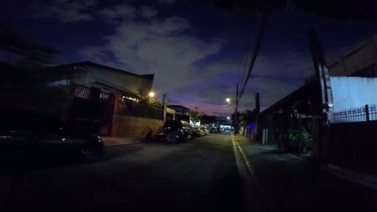 Young Night on Beta Street in Marikina City in the Philippines