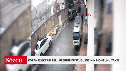 Kopan elektrik teli, üzerine düştüğü kişinin montunu yaktı; o anlar kamerada