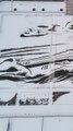 Chinese students create massive snow aircraft carrier in jaw-dropping display