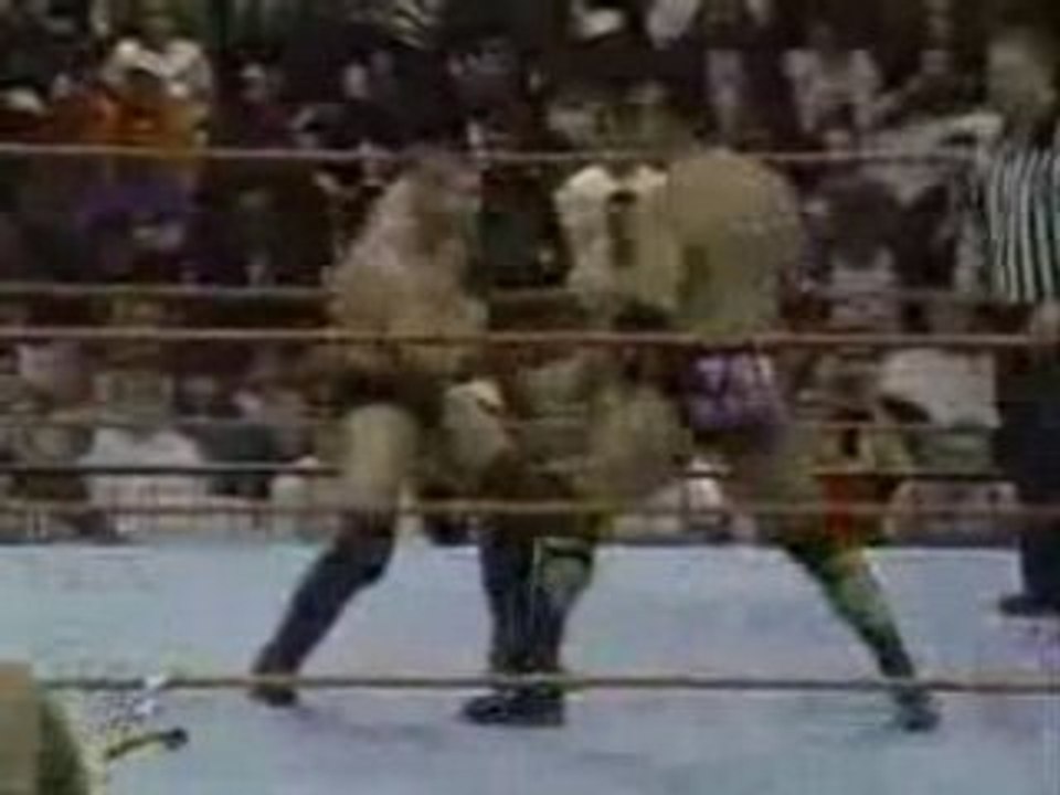 The Rock and D-Lo Brown vs. Ken Shamrock and Mark Henry