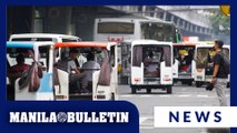 E-trikes travel through Taft Avenue in Manila amid ban on major roads