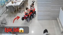 Mischievous twin knocks his brother off a ride-on car in a funny sibling moment