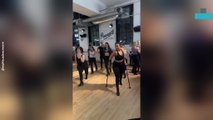Dancer Performs on Crutches During Dance Class