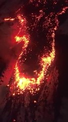 Crackling lava flows from Mount Etna in breathtaking drone footage
