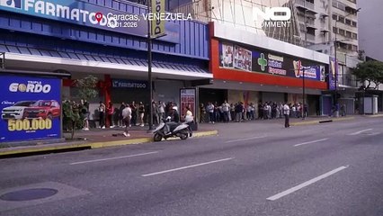 Venezuela: moradores de Caracas abastecem-se de mantimentos numa altura de incerteza política