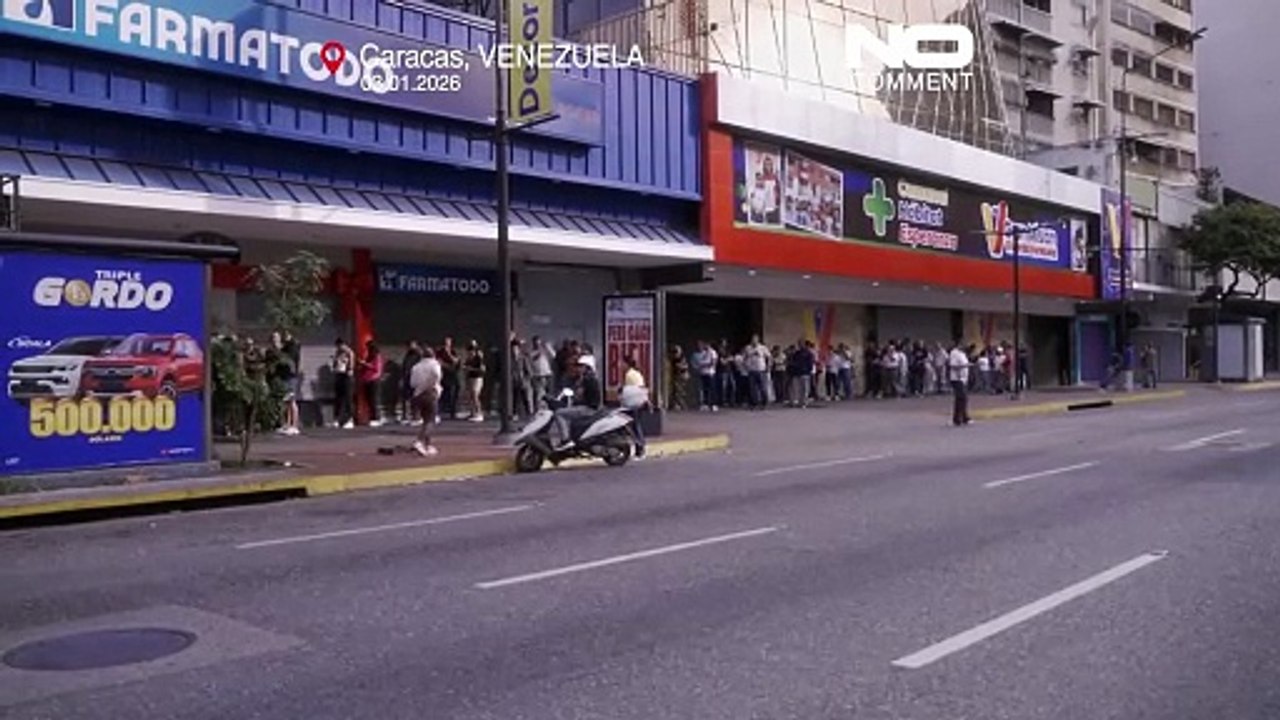 Venezuela: moradores de Caracas abastecem-se de...