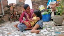 Indian Lady Serving Food to Kids 2