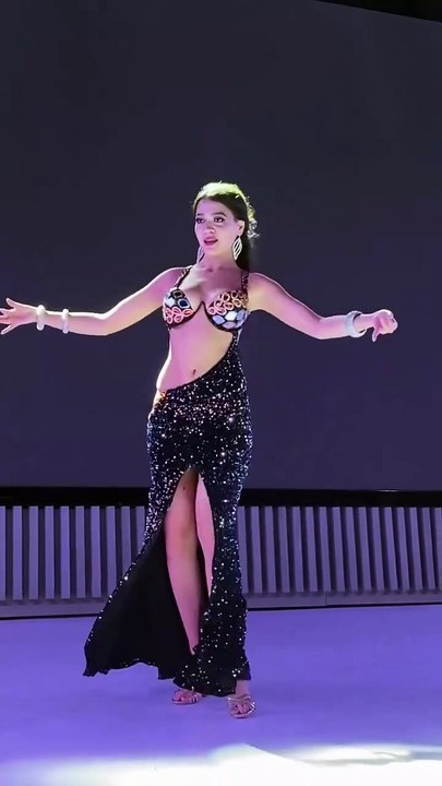 Dance like the wind, swift and free, where each belly dance