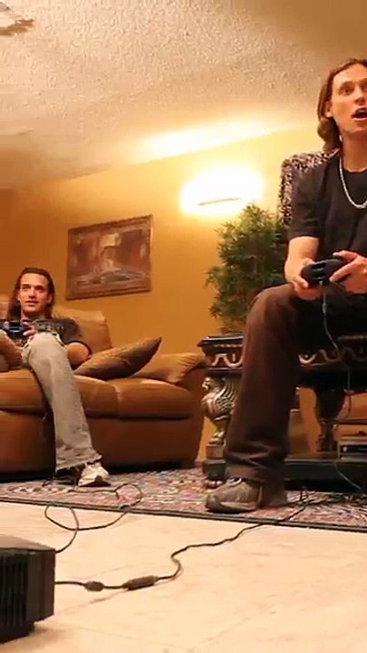 Lion_wants_to_play_video_games_in_living_room(360p)