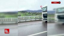 Bursa'da fırtına otobanda tırı devirdi